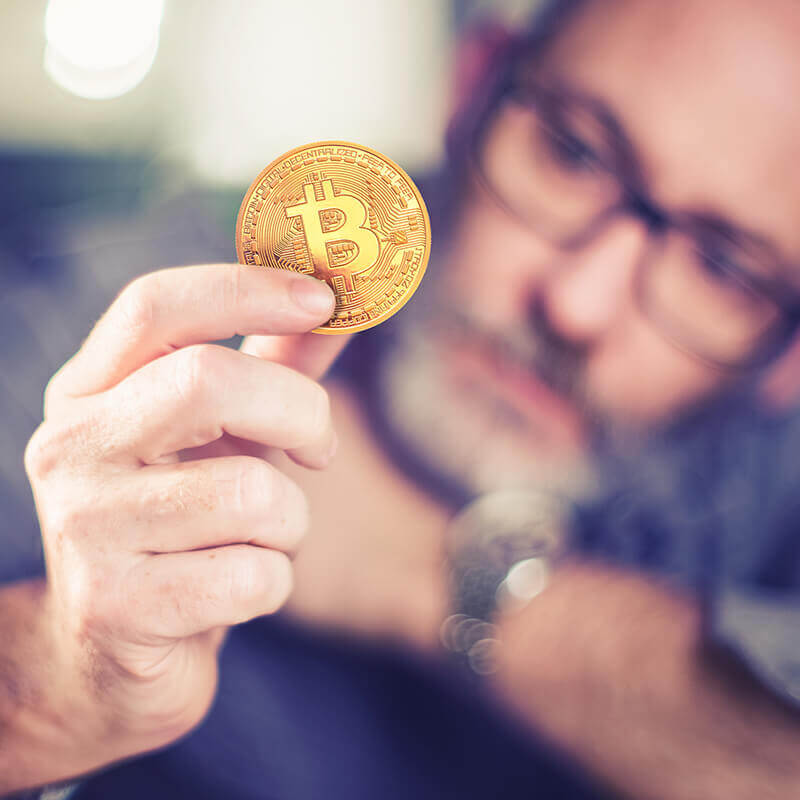 Man holding a coin